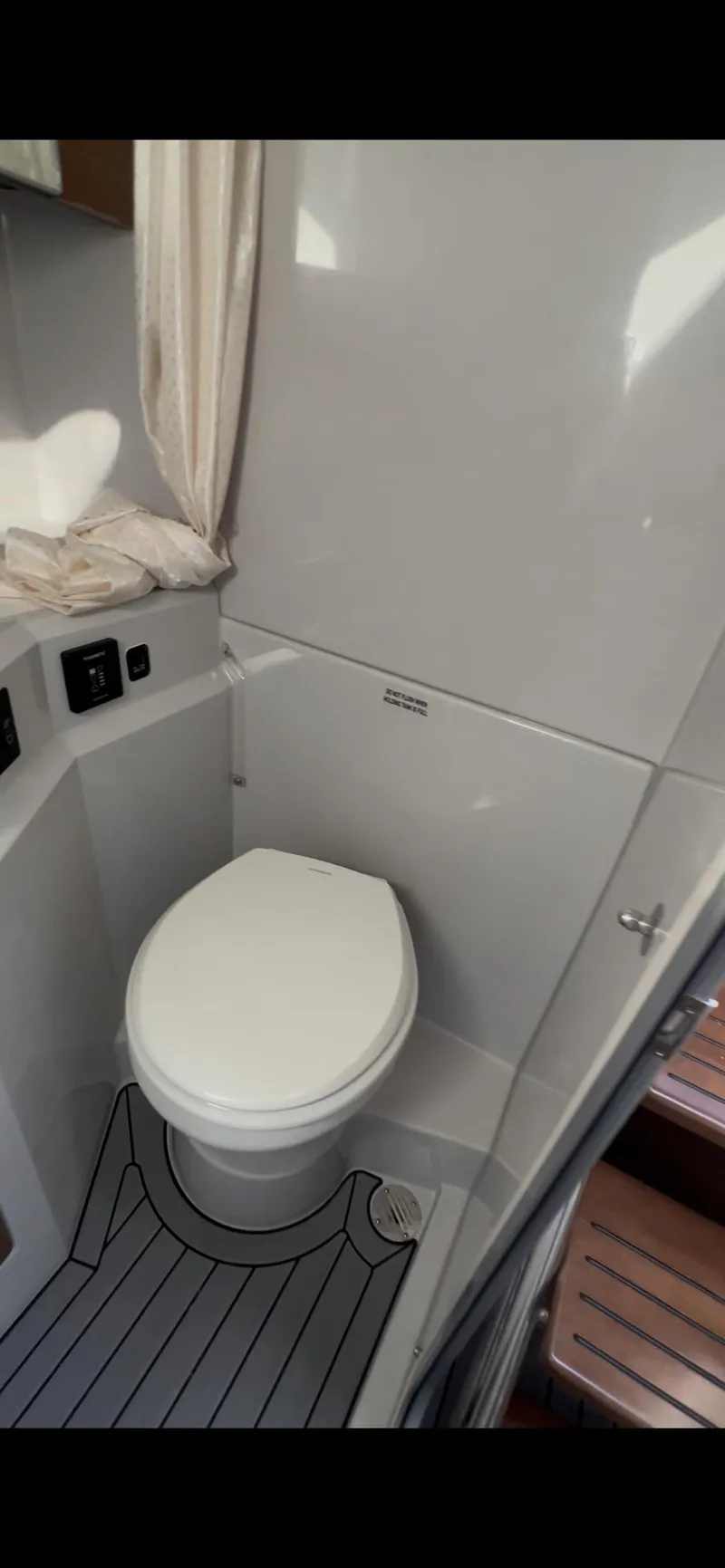 Slide: The Image of 2020 Cruisers Yachts 338OB bathroom with modern sink and mirror. - 26
