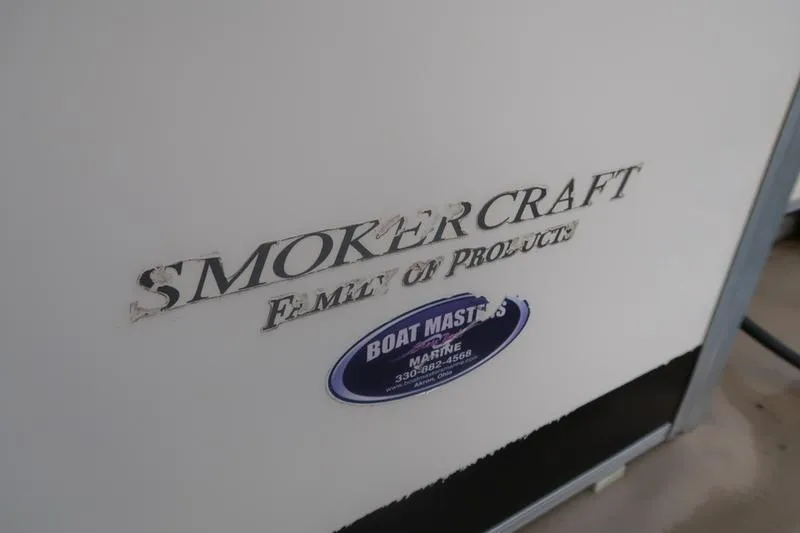 Slide: The Image of 2010 Smoker Craft Sunchaser 8522 boat with logo and Boat Masters Marine sticker. - 14
