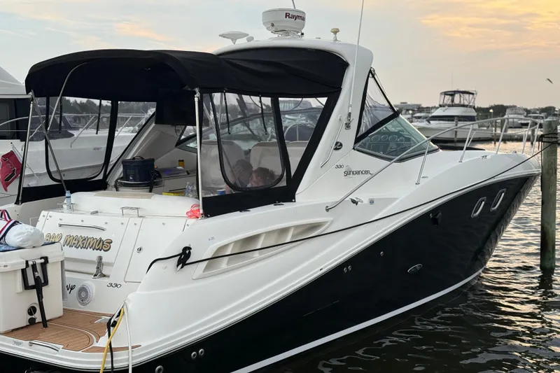 Slide: The Image of 2008 Sea Ray 330 Sundancer docked at marina during sunset. - 7