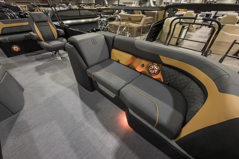Slide: The Image of Luxurious interior of 2026 Godfrey Sweetwater 22' Tritoon with stylish seating and ambient lighting. - 7