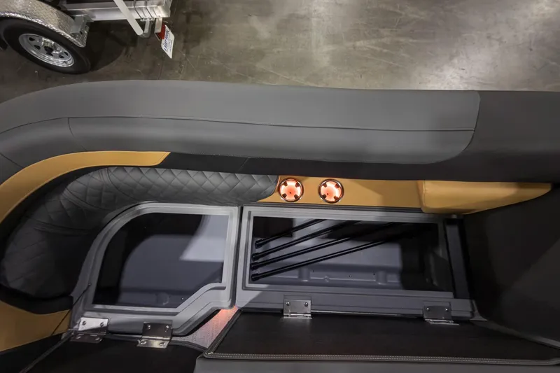 Slide: The Image of Interior view of 2026 Godfrey Sweetwater 22' Tritoon, featuring seating and storage compartments. - 9