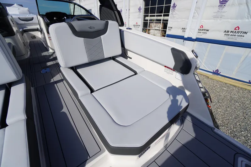 Slide: The Image of 2026 Chaparral 250 OSX boat interior with luxurious seating and modern design. - 46