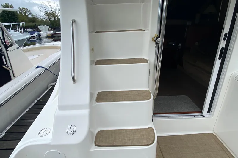 Slide: The Image of Staircase on 2007 Silverton 36 Convertible yacht, leading to cabin entrance. - 14