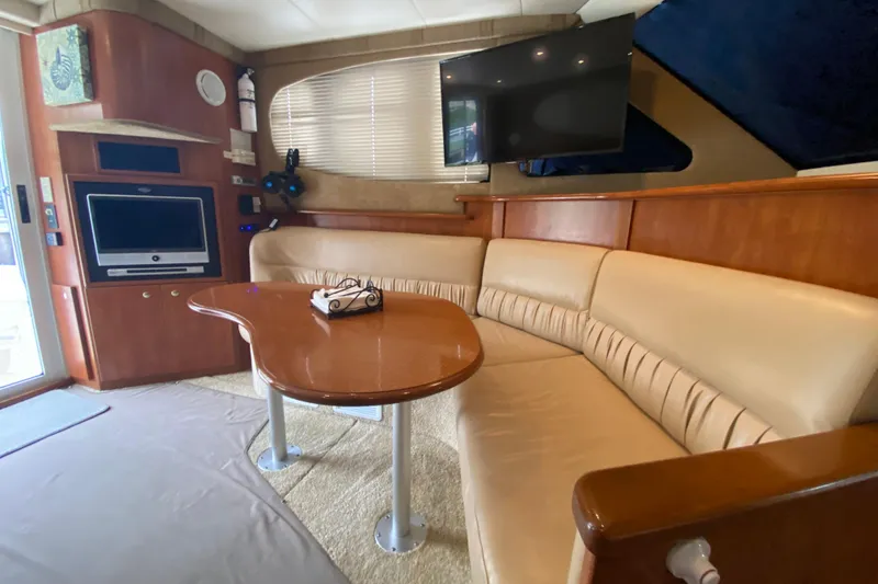 Slide: The Image of Luxurious interior of 2007 Silverton 36 Convertible yacht with plush seating and entertainment system. - 29