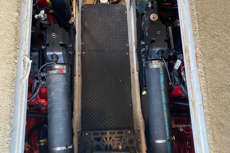 Slide: The Image of Engine compartment of a 2007 Silverton 36 Convertible boat, showcasing dual engines. - 43