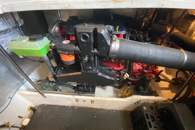 Slide: The Image of Engine compartment of a 2007 Silverton 36 Convertible boat, showcasing mechanical components. - 47