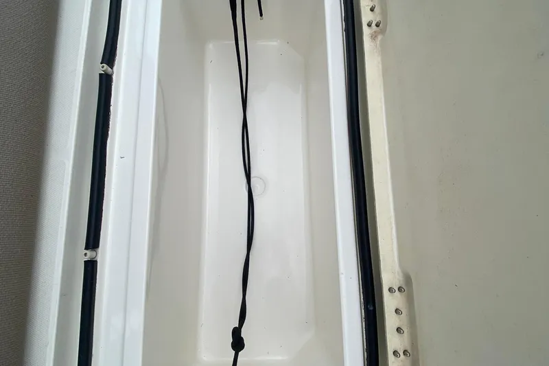 Slide: The Image of Storage compartment of a 2007 Silverton 36 Convertible boat, featuring a clean interior. - 48