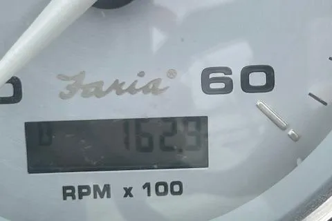 Slide: The Image of Close-up of a Faria tachometer showing 1629 RPM on a 2008 Rinker 282 Captiva Cuddy. - 7