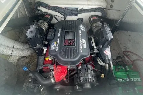 Slide: The Image of 2008 Rinker 282 Captiva Cuddy engine compartment with Volvo Penta motor and Interstate battery. - 9