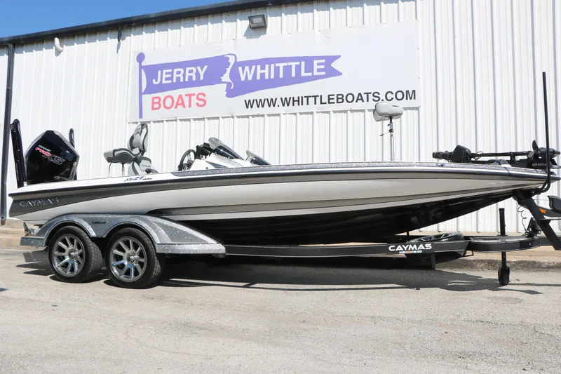 The Image of 2025 Caymas CX 21 PRO boat on trailer at Jerry Whittle Boats dealership. - 1