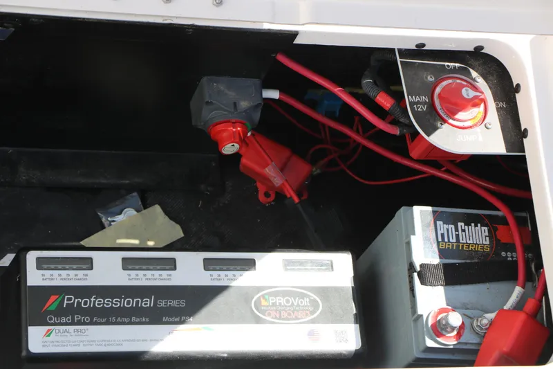 Slide: The Image of Battery compartment of 2025 Caymas CX 21 PRO with Pro-Guide batteries and electrical components. - 42