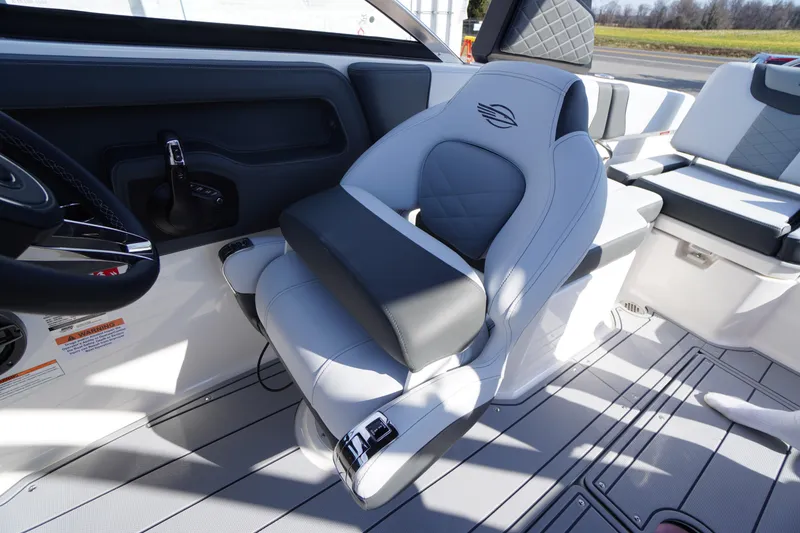 Slide: The Image of Luxury seating in 2026 Chaparral 250 OSX boat cockpit, featuring modern design and comfort. - 21