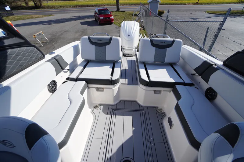 Slide: The Image of 2026 Chaparral 250 OSX boat interior with sleek seating and modern design. - 35