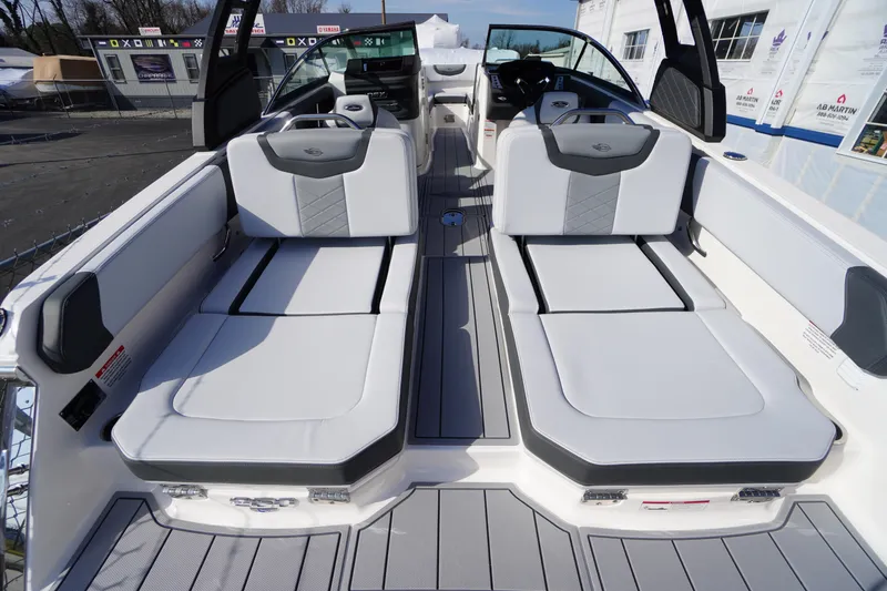 Slide: The Image of 2026 Chaparral 250 OSX boat interior with luxurious seating and modern design. - 46