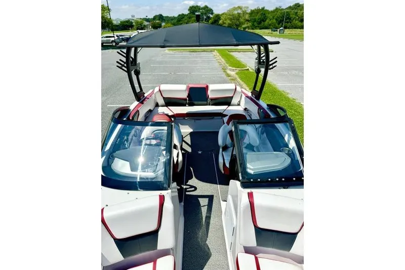 Slide: The Image of 2015 Scarab 215 HO Impulse boat with sleek interior and modern design. - 14