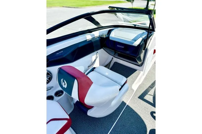 Slide: The Image of Interior of 2015 Scarab 215 HO Impulse boat with stylish seating and dashboard. - 19