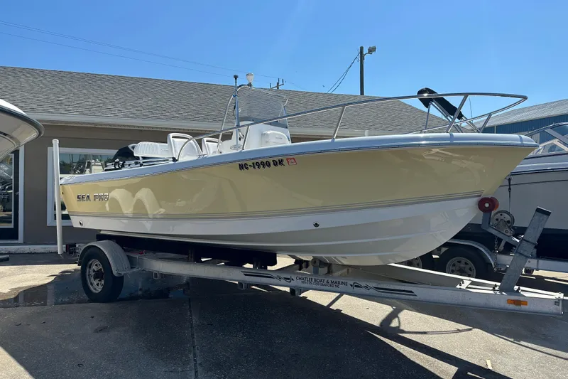 The Image of 2008 Sea Pro 186 Center Console boat on trailer, parked outdoors. - 0