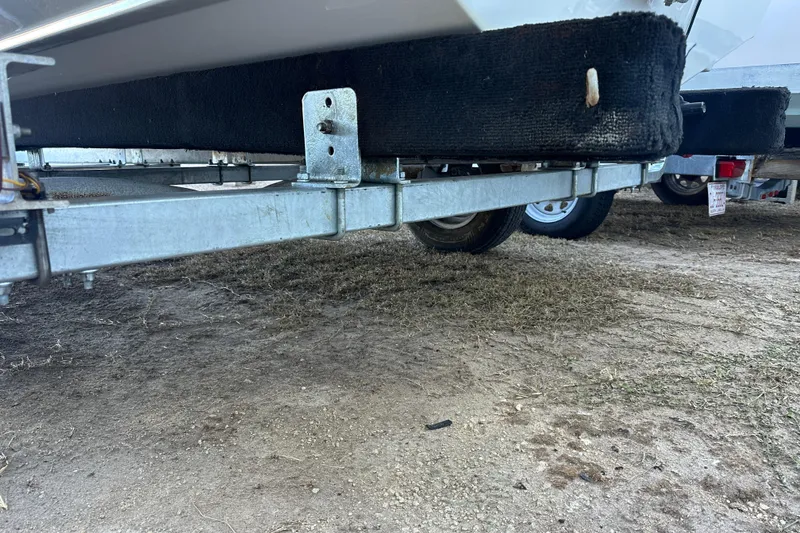 Slide: The Image of Trailer for 2008 Sea Pro 186 Center Console boat on dirt ground. - 20