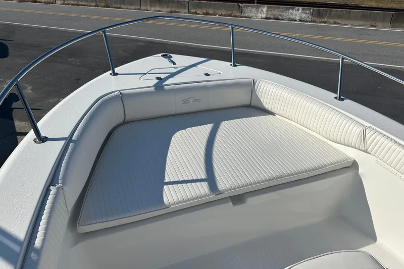 Slide: The Image of 2008 Sea Pro 186 Center Console boat with cushioned seating and railings. - 4
