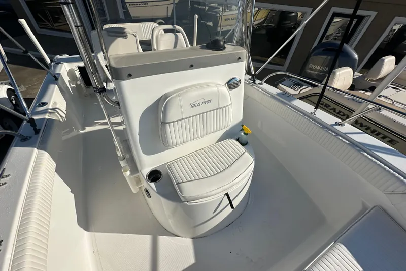 Slide: The Image of 2008 Sea Pro 186 Center Console boat interior with seating and console details. - 6