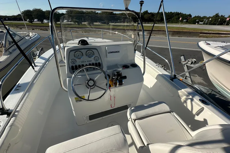 Slide: The Image of 2008 Sea Pro 186 Center Console boat interior with steering wheel and gauges. - 8