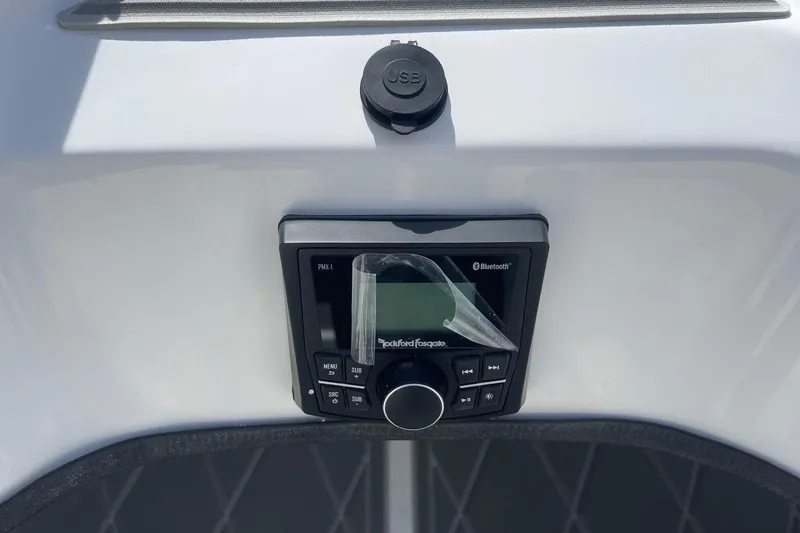 Slide: The Image of Control panel with Bluetooth and USB on 2026 Lightning Boat Works Strike 200. - 18