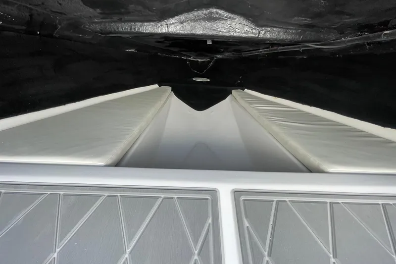 Slide: The Image of Interior view of 2026 Lightning Boat Works Strike 200, featuring white cushioned seating. - 28