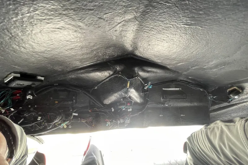 Slide: The Image of Interior view of 2026 Lightning Boat Works Strike 200, showcasing wiring and components. - 30