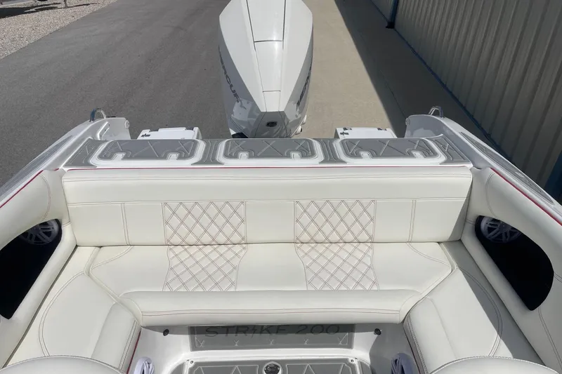 Slide: The Image of 2026 Lightning Boat Works Strike 200 with luxurious white seating and sleek design. - 8