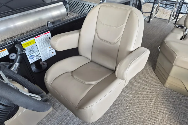 Slide: The Image of Captain's chair in 2026 Sylvan Mirage 820 CLZ DH boat, featuring beige upholstery. - 10