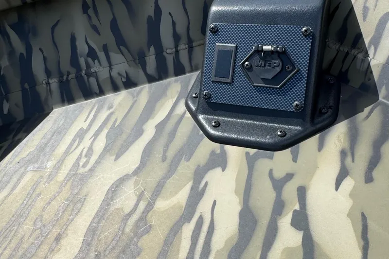 Slide: The Image of 2026 SeaArk 1652 Special boat interior with camouflage pattern and MEP panel. - 5