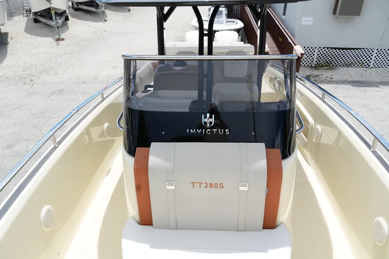 Slide: The Image of 2024 Invictus TT280S boat interior, showcasing sleek design and modern features. - 11