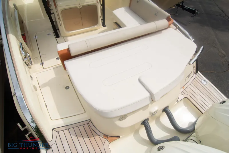 Slide: The Image of 2024 Invictus TT280S boat with spacious seating and sleek design at Big Thunder Marine. - 12