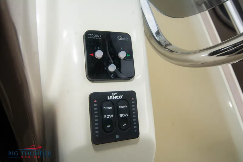 Slide: The Image of Control panel of 2024 Invictus TT280S boat with Lenco and Quick systems. - 31