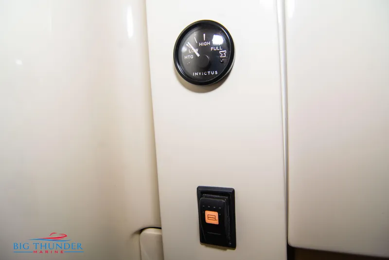 Slide: The Image of 2024 Invictus TT280S gauge and switch panel, featuring Big Thunder Marine branding. - 43