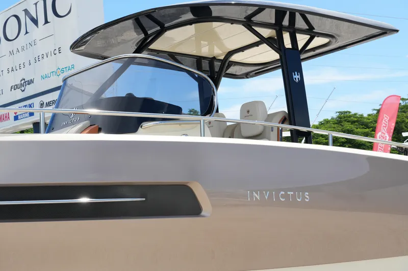 Slide: The Image of 2024 Invictus TT280S boat with sleek design at Iconic Marine dealership. - 7