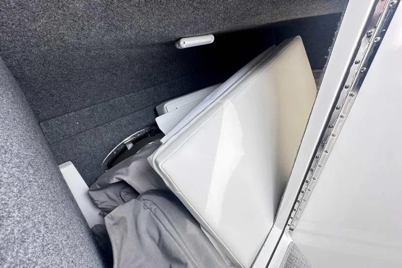 Slide: The Image of Interior storage compartment of 2022 Formula 350 Crossover Bowrider I/O boat. - 19