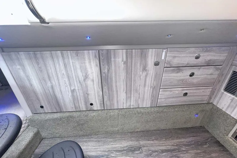 Slide: The Image of 2022 Formula 350 Crossover Bowrider I/O interior with wood cabinetry and modern design. - 31