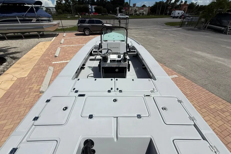 Slide: The Image of 2026 Action Craft 20 Flatsmaster boat with spacious deck and modern console. - 19