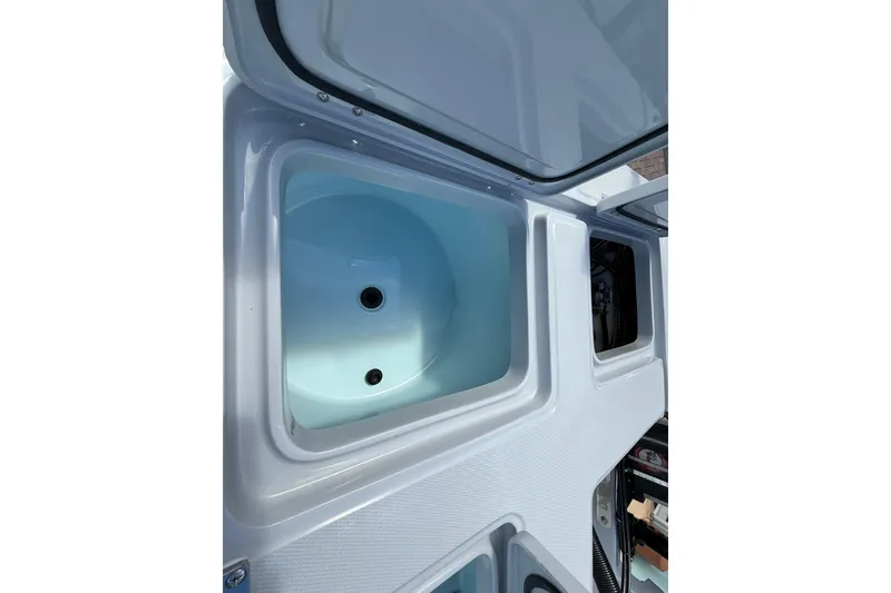 Slide: The Image of 2026 Action Craft 20 Flatsmaster boat interior compartment view. - 15