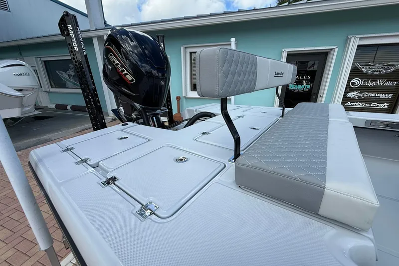 Slide: The Image of 2026 Action Craft 20 Flatsmaster boat with sleek seating and powerful engine. - 4