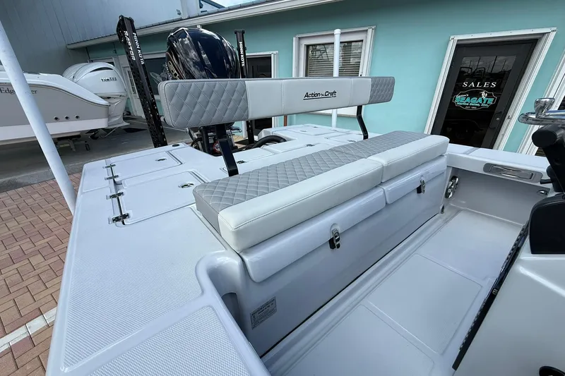 Slide: The Image of 2026 Action Craft 20 Flatsmaster boat with cushioned seating and sleek design. - 9