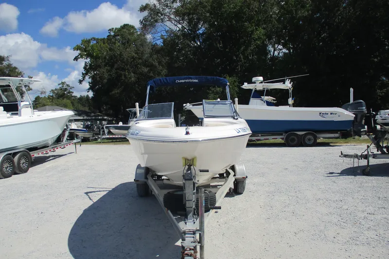Slide: The Image of 2007 CHAPARALL 180 boat on trailer, parked outdoors under a clear sky. - 1