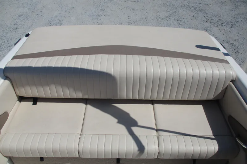 Slide: The Image of Beige leather seating on 2007 CHAPARALL 180 boat, featuring ribbed design. - 10