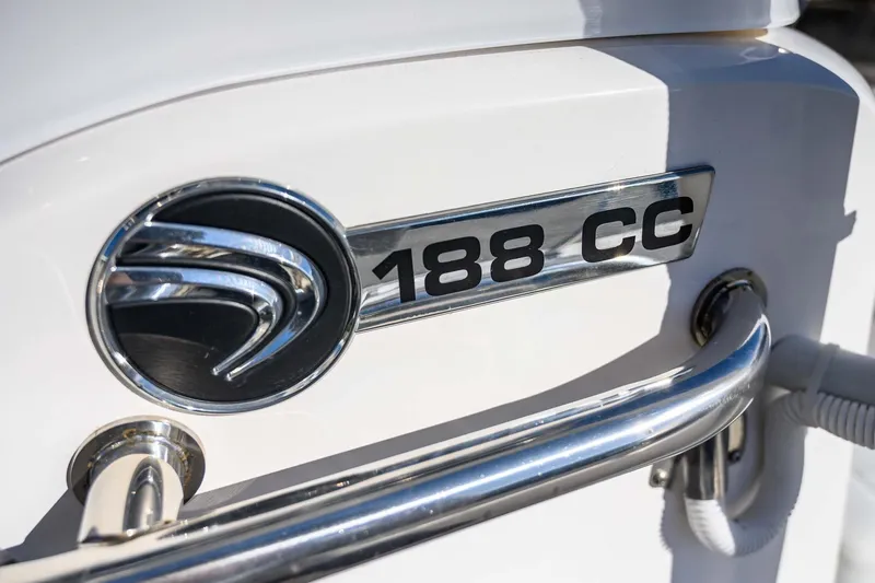 Slide: The Image of 2016 Edgewater 188CC boat emblem and model badge on white surface. - 17