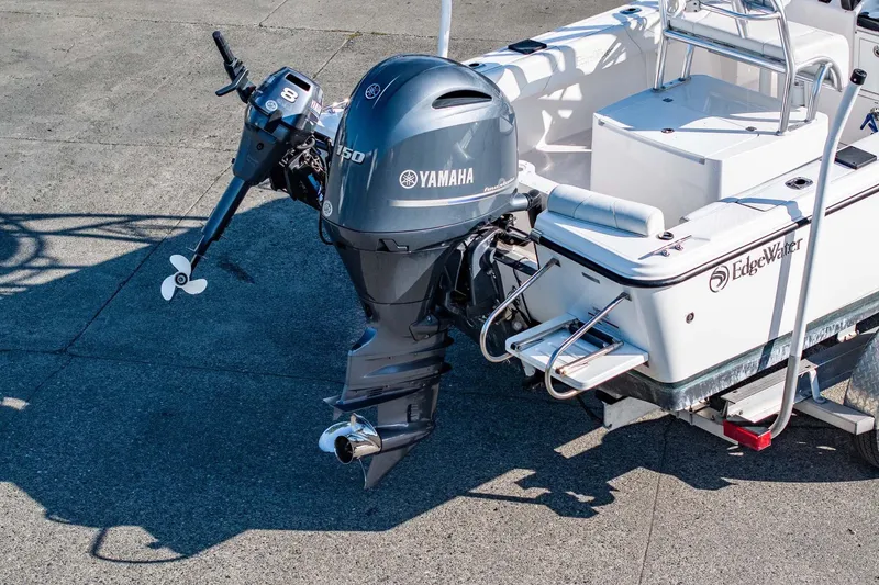 Slide: The Image of 2016 Edgewater 188CC boat with Yamaha outboard motor on a trailer. - 8