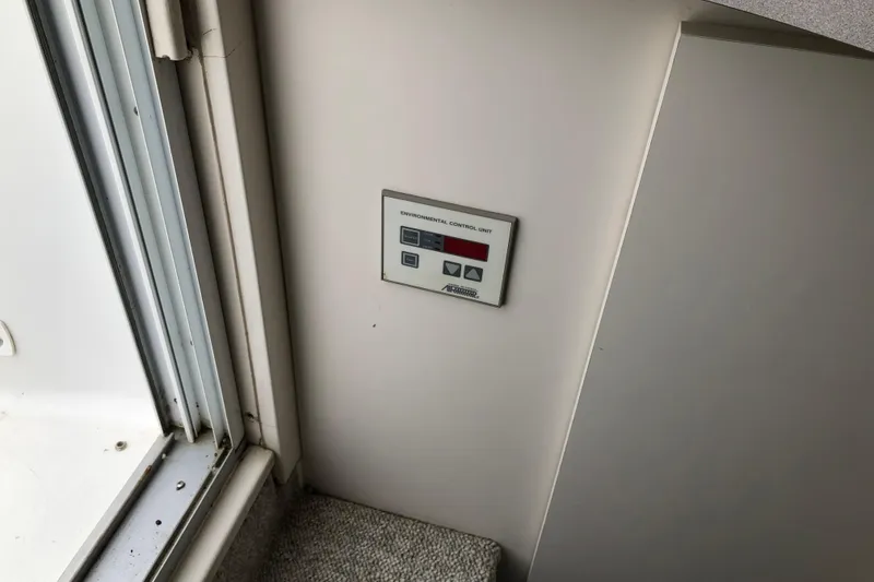 Slide: The Image of Environmental control unit on 1994 Mainship 31 Sedan Bridge yacht interior. - 13