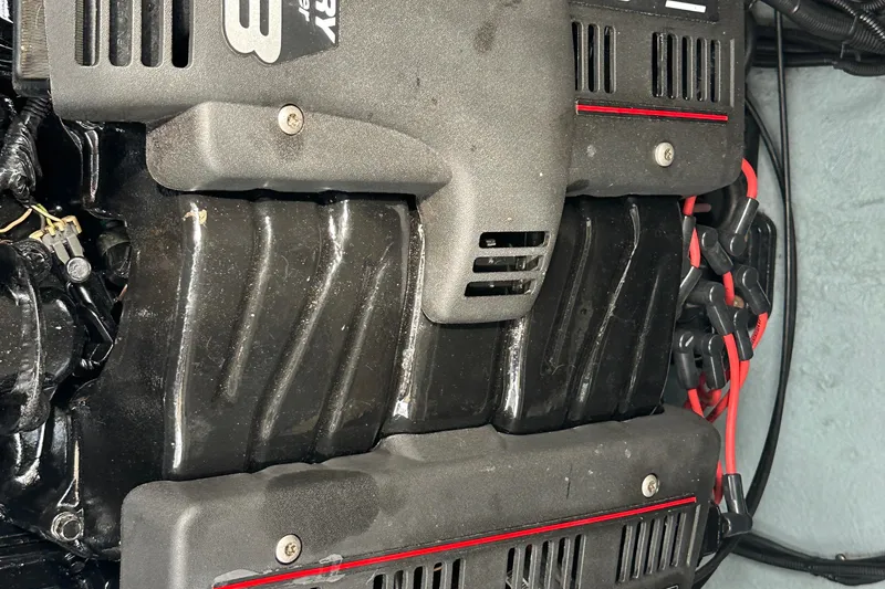 Slide: The Image of Engine of a 2001 Sea Ray 270 Sundancer boat, featuring detailed components. - 23