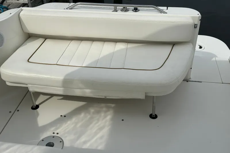 Slide: The Image of White seating area on a 2001 Sea Ray 270 Sundancer boat. - 8