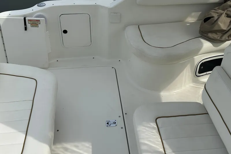 Slide: The Image of Interior seating area of a 2001 Sea Ray 270 Sundancer boat. - 9